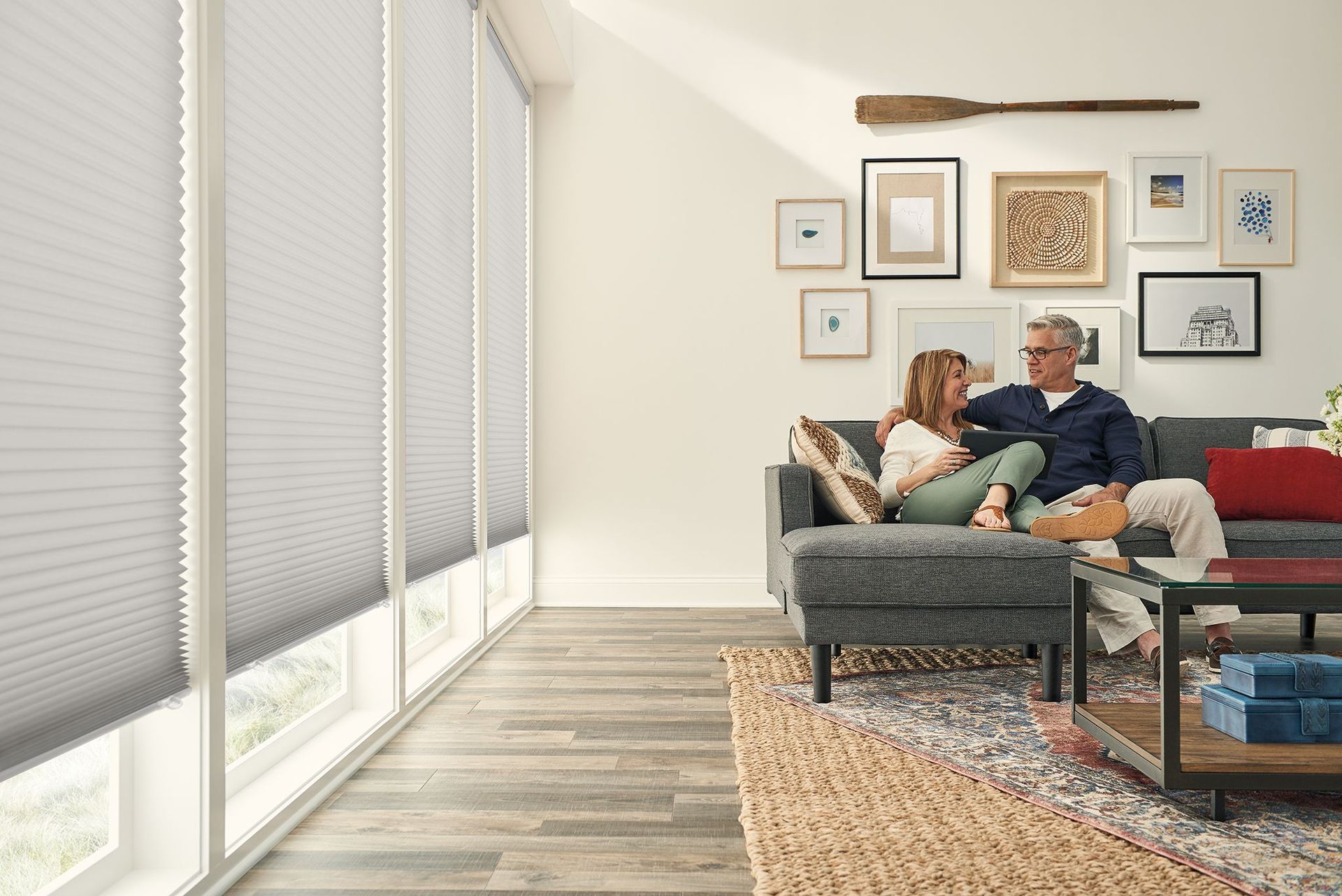 Custom cellular shades in a bright furnished living room